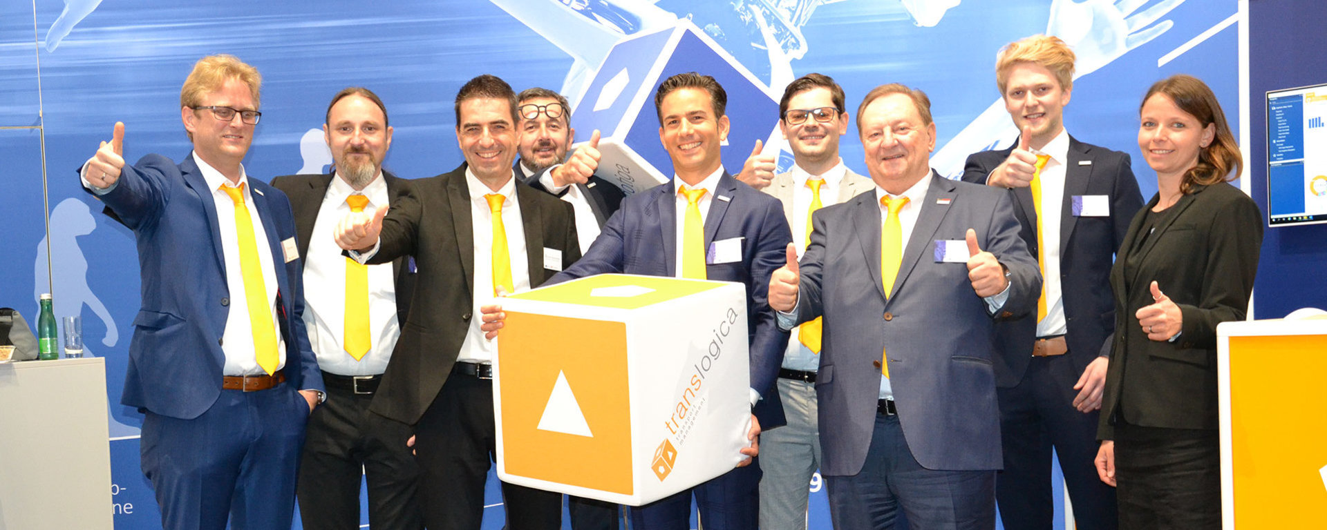 csm_Translogica_Karriere_Teambild_Messestand_749b9f4329